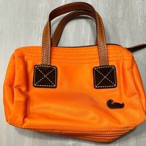 Small orange nylons Dooney and Bourke purse